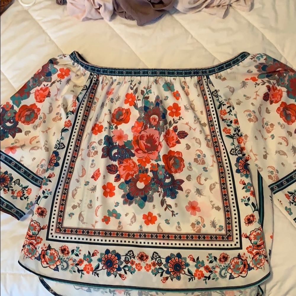 Off the shoulder shirt.